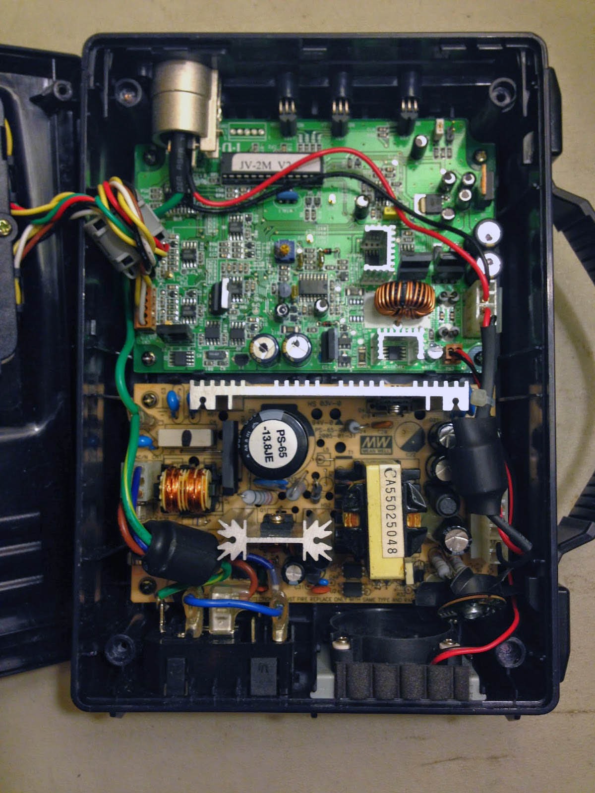 the internal motherboard of an IDX jl-2 plus charger